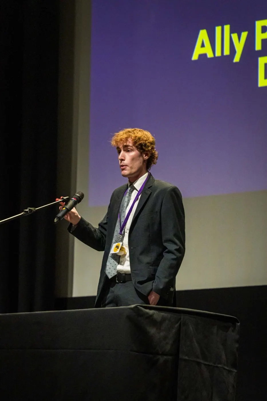 Oliver Bardsley speaking at a debating competition